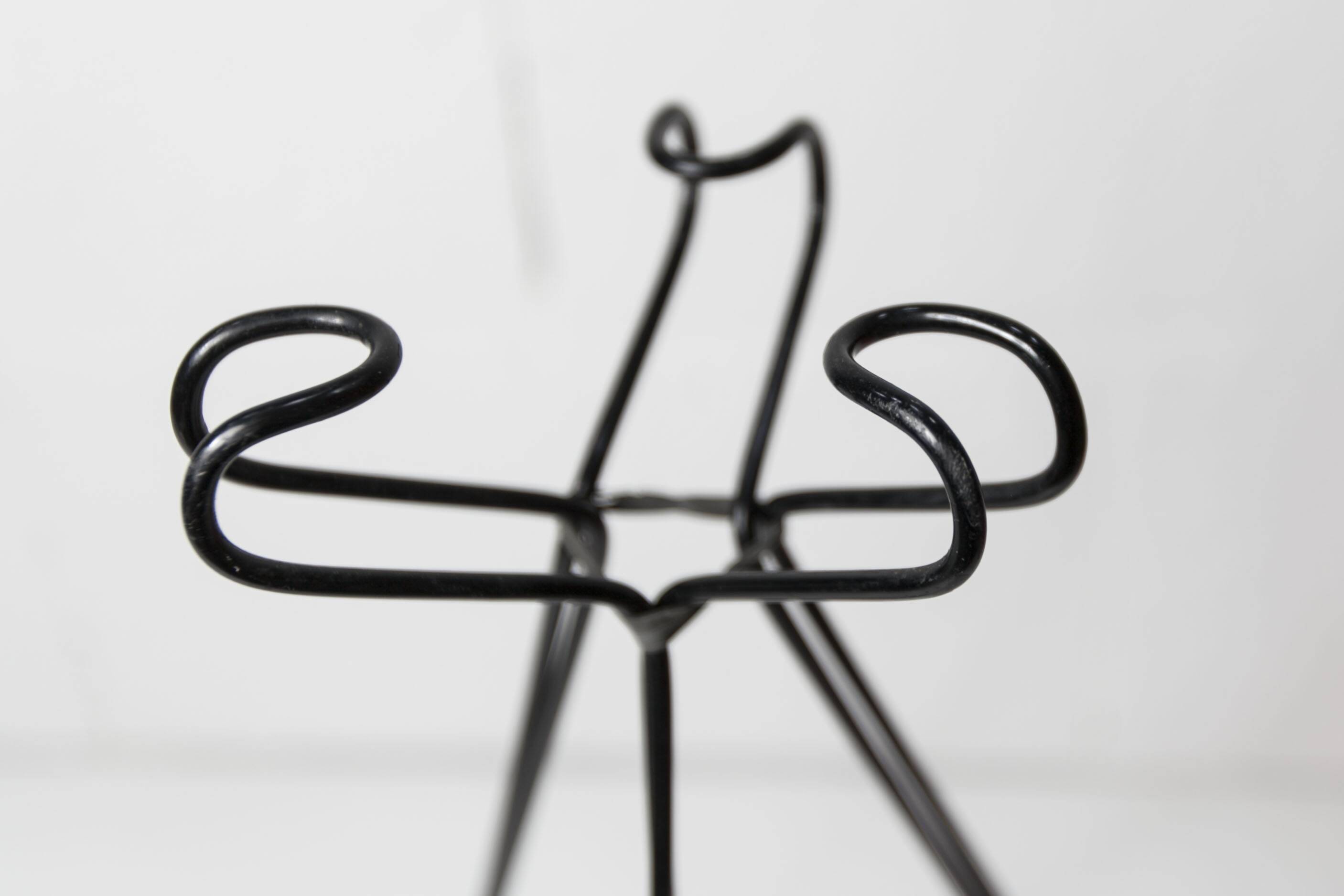 Ashtray on black colored glass stand 1970