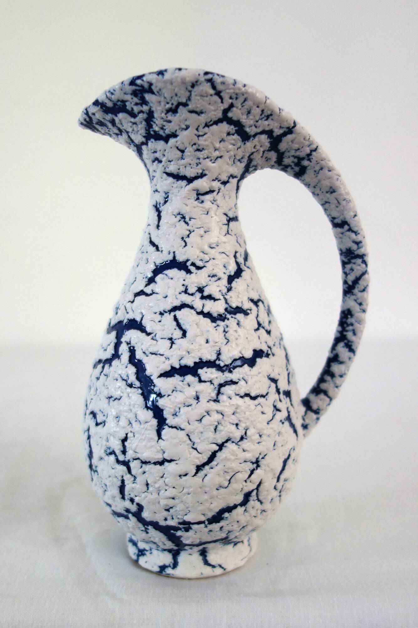 Small vintage snow stoneware vase