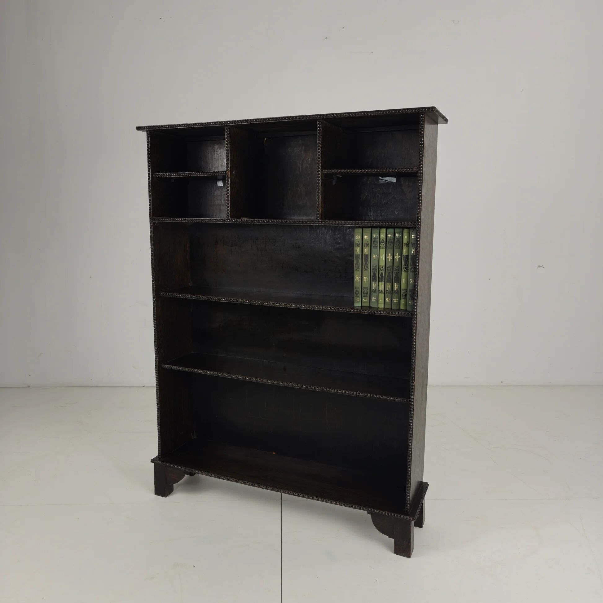 20th century open bookcase with bead motif