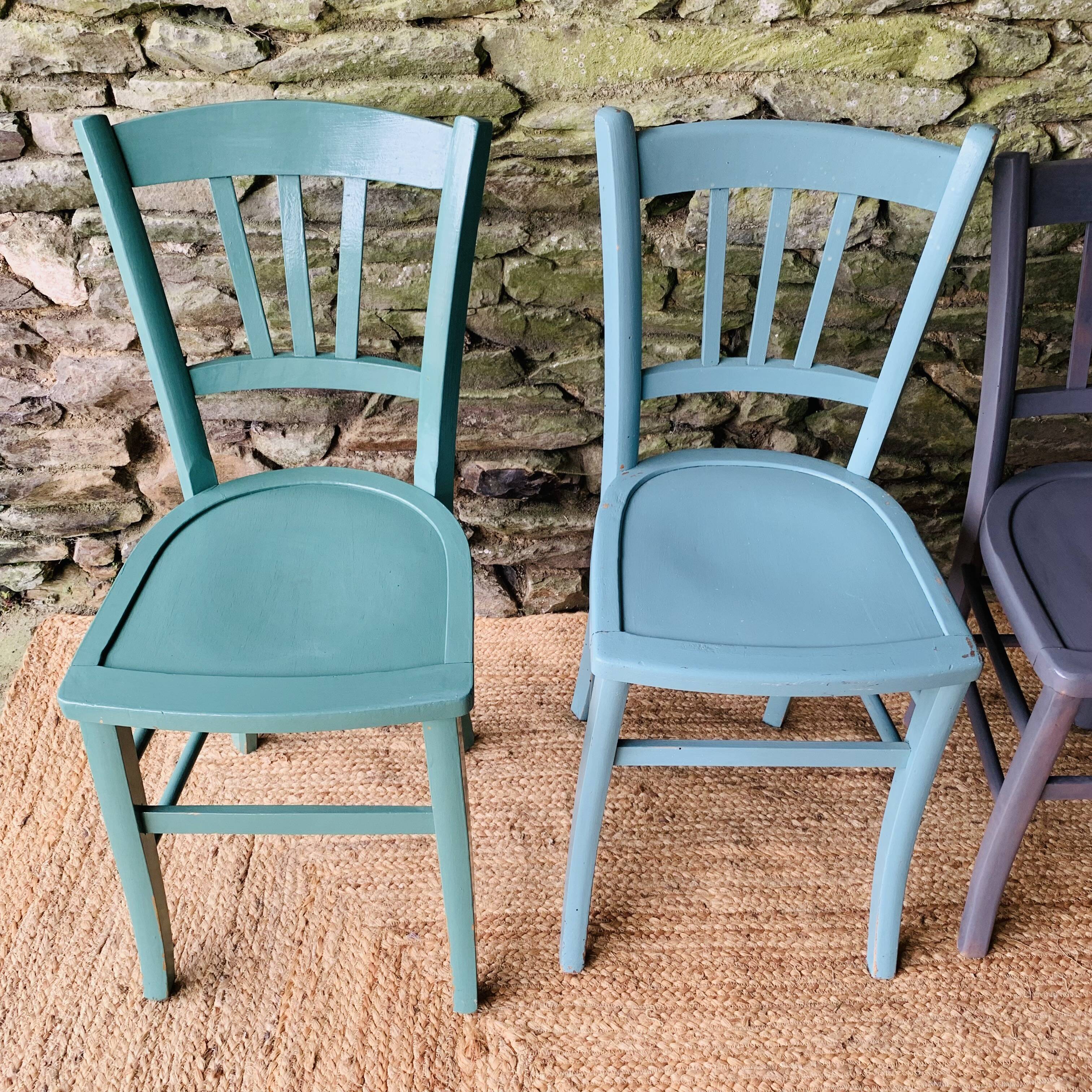 Set of four mismatched bistro chairs