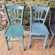 Set of four mismatched bistro chairs
