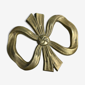 “Knot” trivet in vintage golden brass