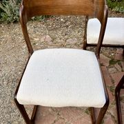 Four vintage Baumann sled chairs from the 1960s 1970s.