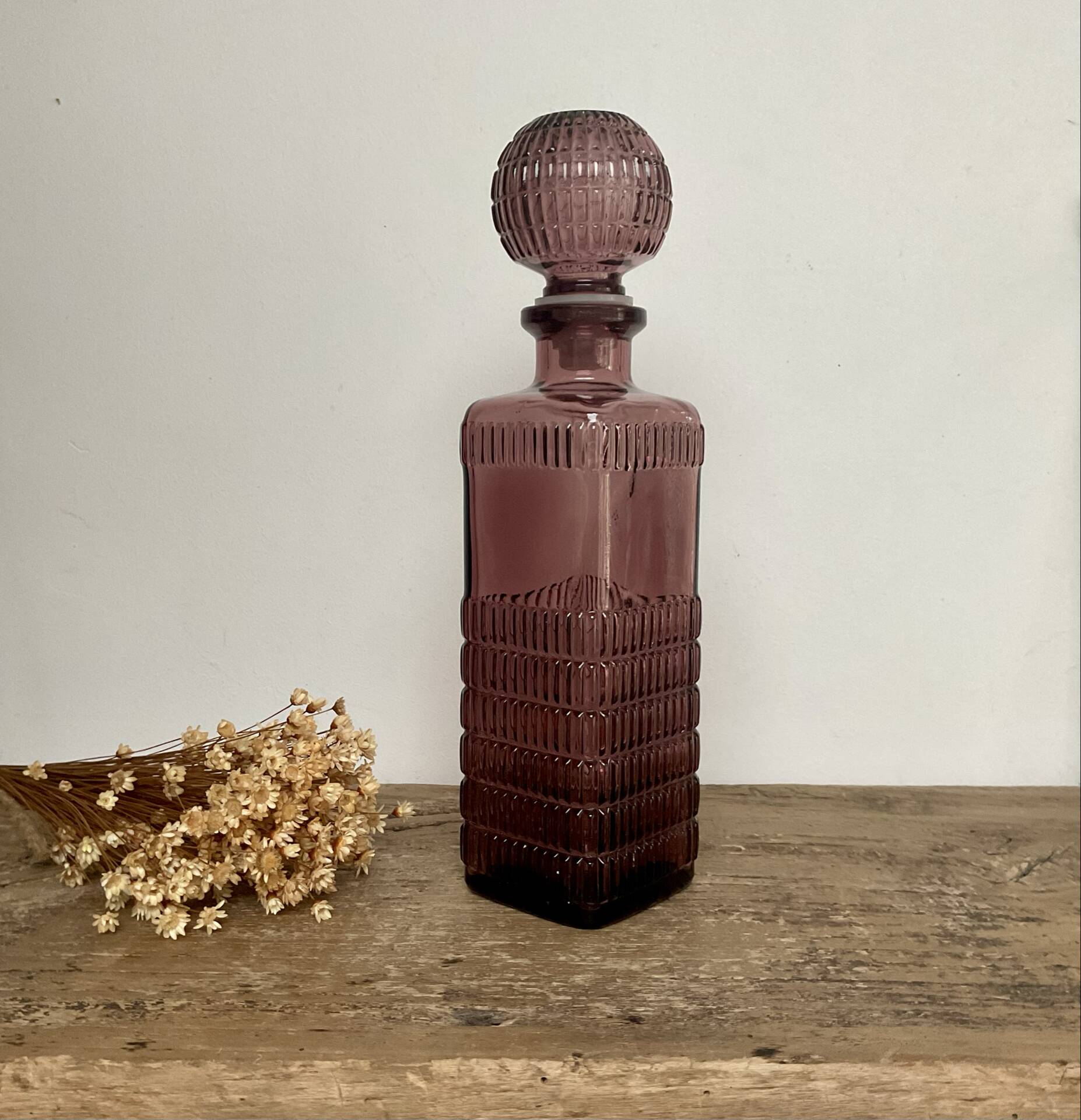 Plum glass bottle