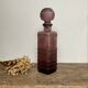 Plum glass bottle
