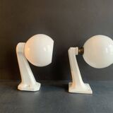 Pair of Art Deco porcelain wall lights with white Opaline globes, 1920