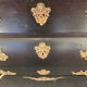 Commode tombeau patine noire style Louis XV
