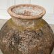 Old terracotta jar with its metal clasps, late 19th century.