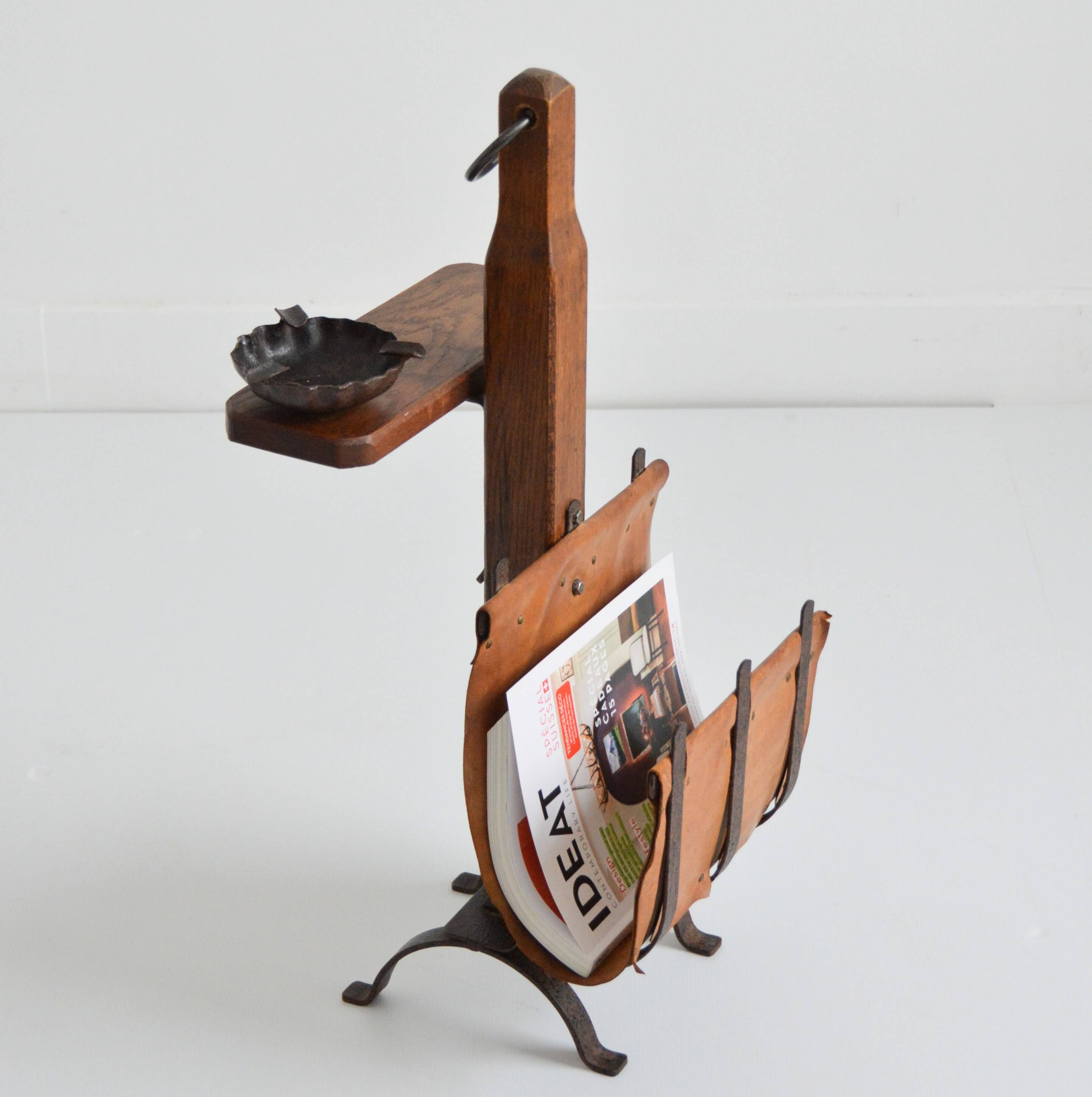 Vintage leather magazine rack with shelf and brutalist/rustic ashtray.