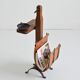 Vintage leather magazine rack with shelf and brutalist/rustic ashtray.