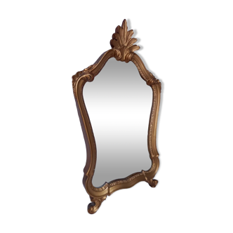 Old mirror in gilded wood