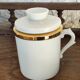 2 white and gold Limoges porcelain tea cups