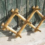 Old accordion coat rack
