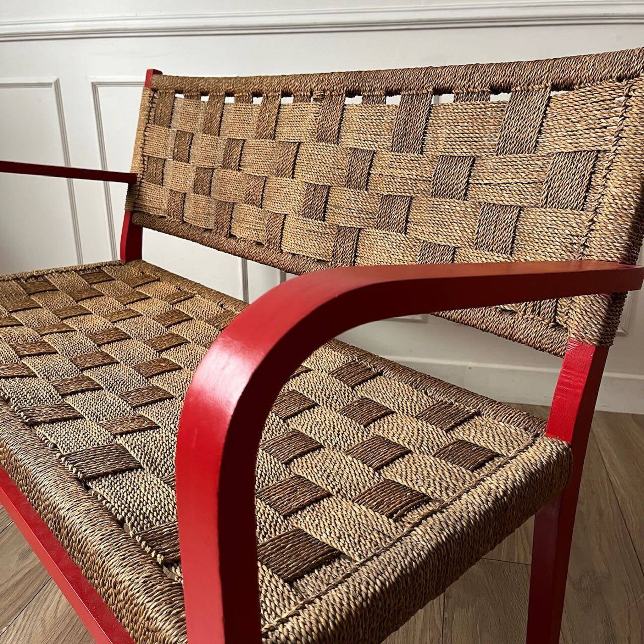 Vintage bench in red wood and rope
