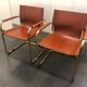 Pair of Cantilever armchairs tawny leather circa 1970