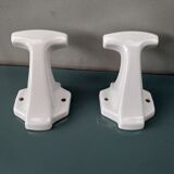 Pair of art deco porcelain coat racks