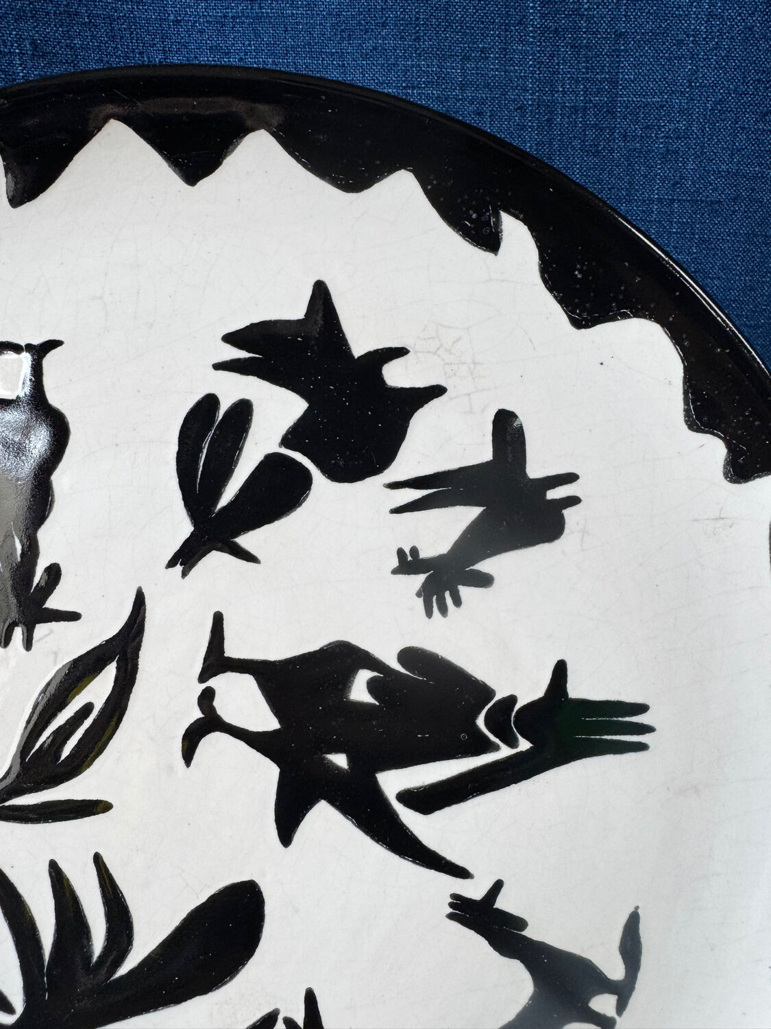 Large ceramic plate J. Lurçat with zoomorphic decoration in black on a white background.