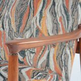 Scandinavian style armchair with terracotta patterns