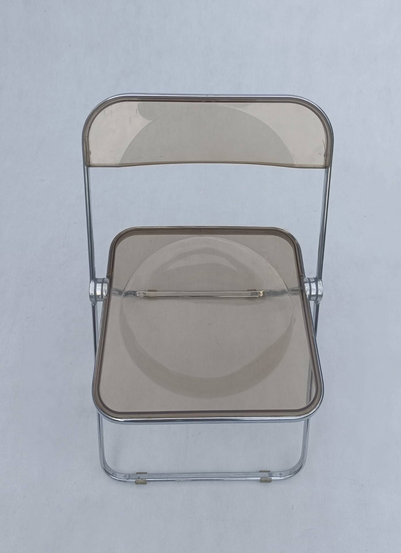 Plia folding chair by Giancarlo Piretti for Castelli