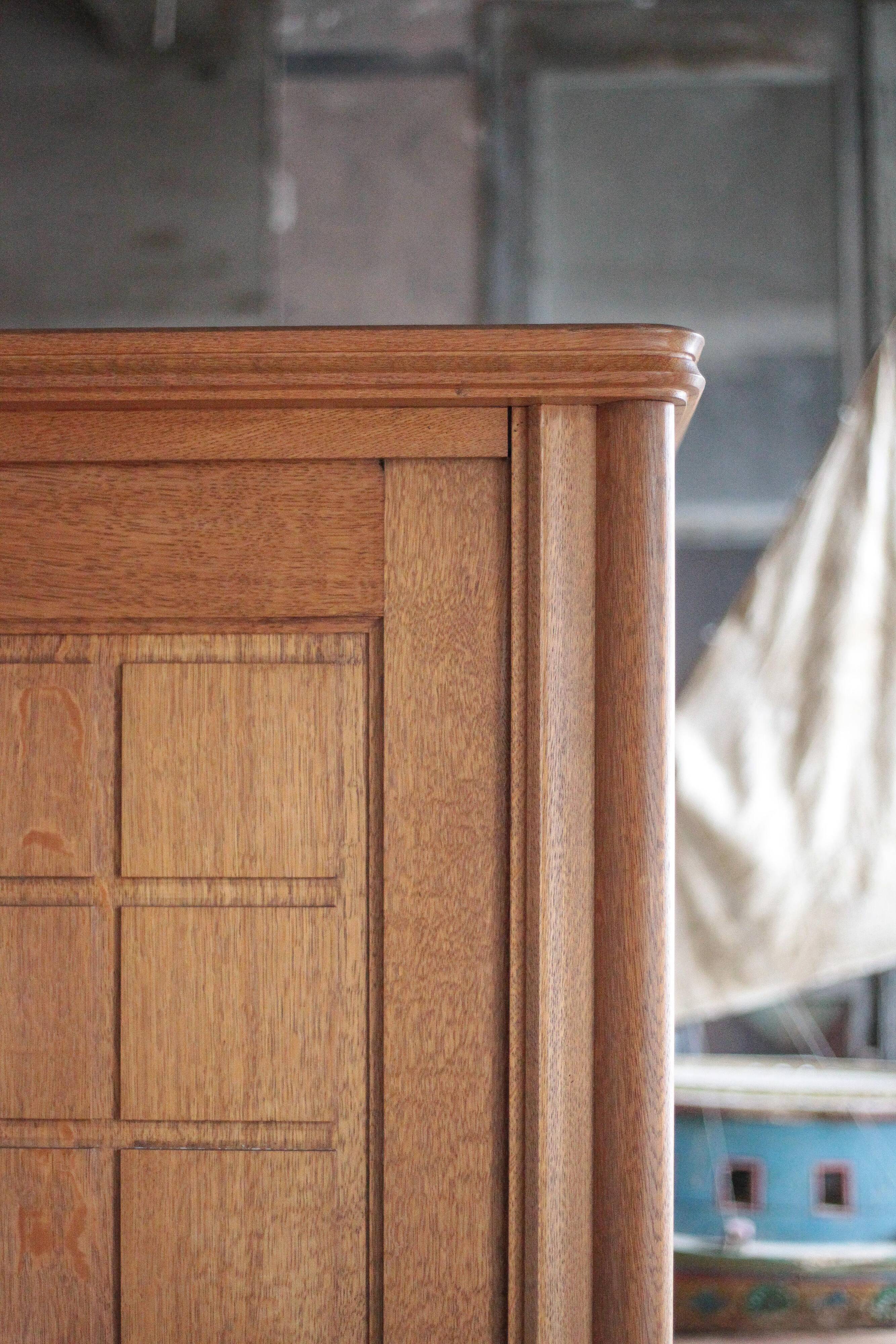 Vintage wooden wardrobe with sliding doors.