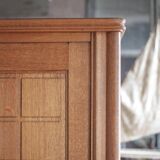 Vintage wooden wardrobe with sliding doors.