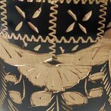 Vintage brass vase with black and gold patina, corolla neck. From India. Mid-20th century. Engraved heart/floral/leafy patterns. High 20 cm