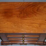Set of hardwood dressers with finely carved bases.