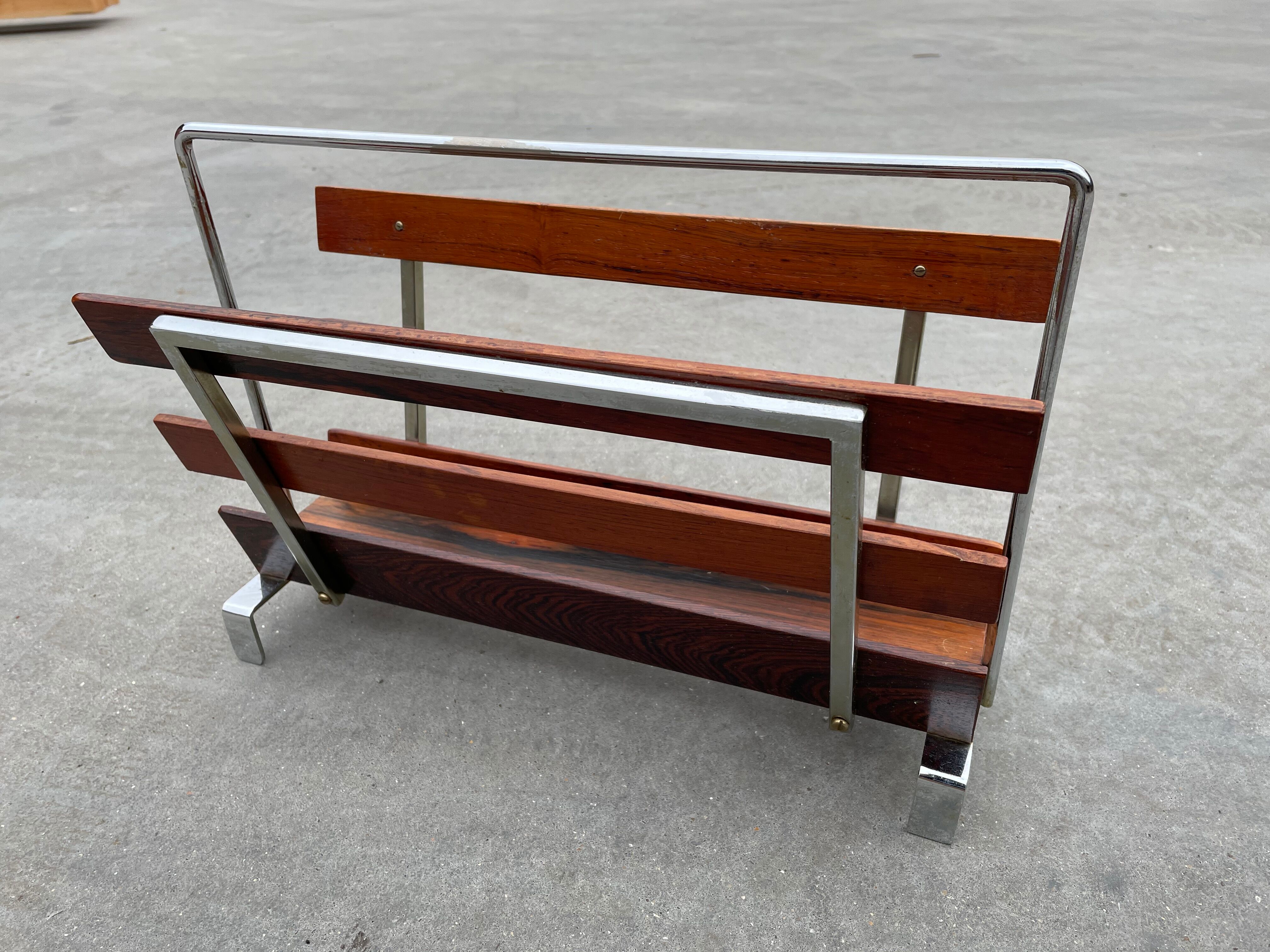 Vintage magazine rack from  rosewood and chrome design