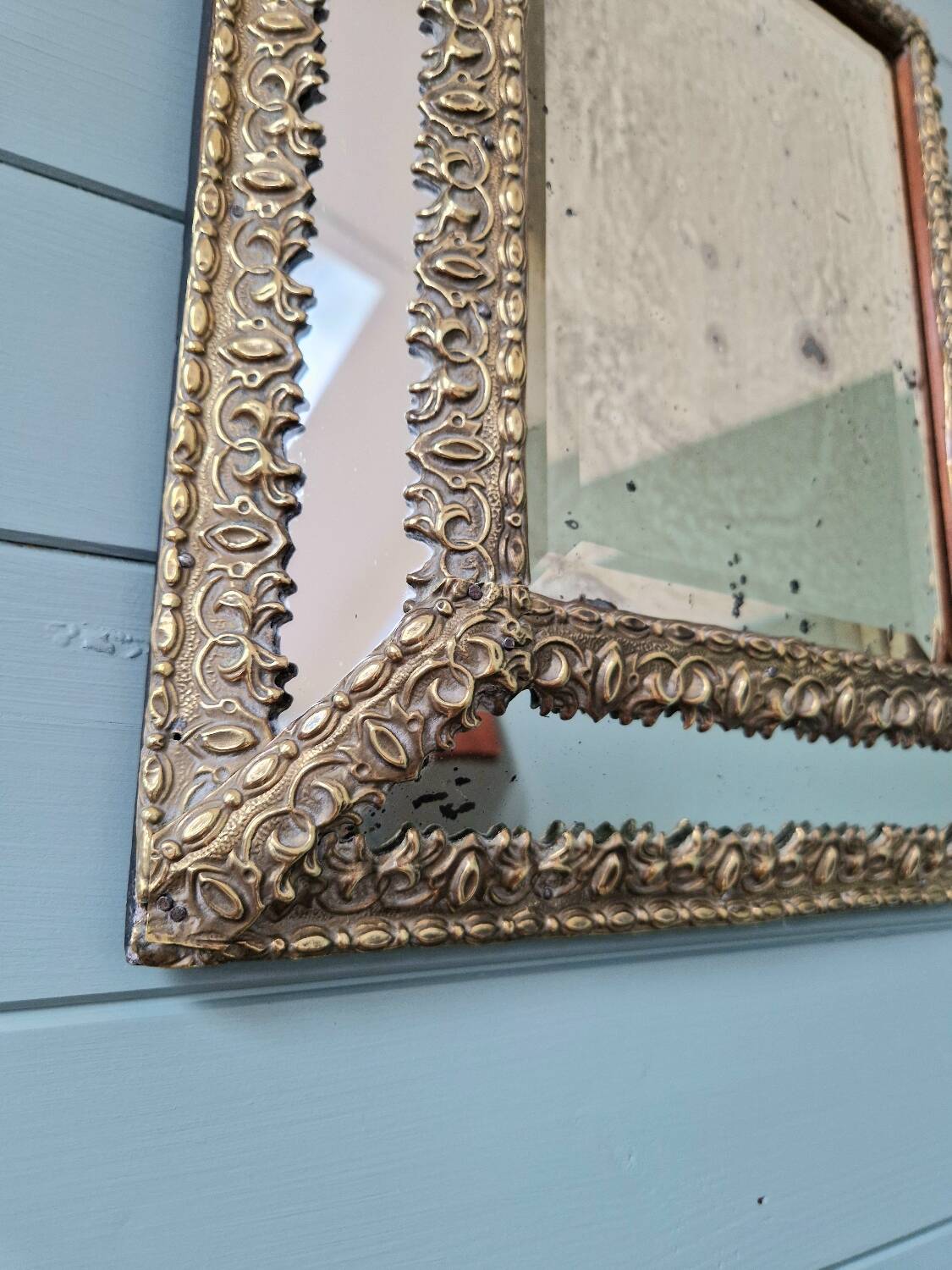 Mirror with embossed brass and mercury glass glazing beads, 19th century