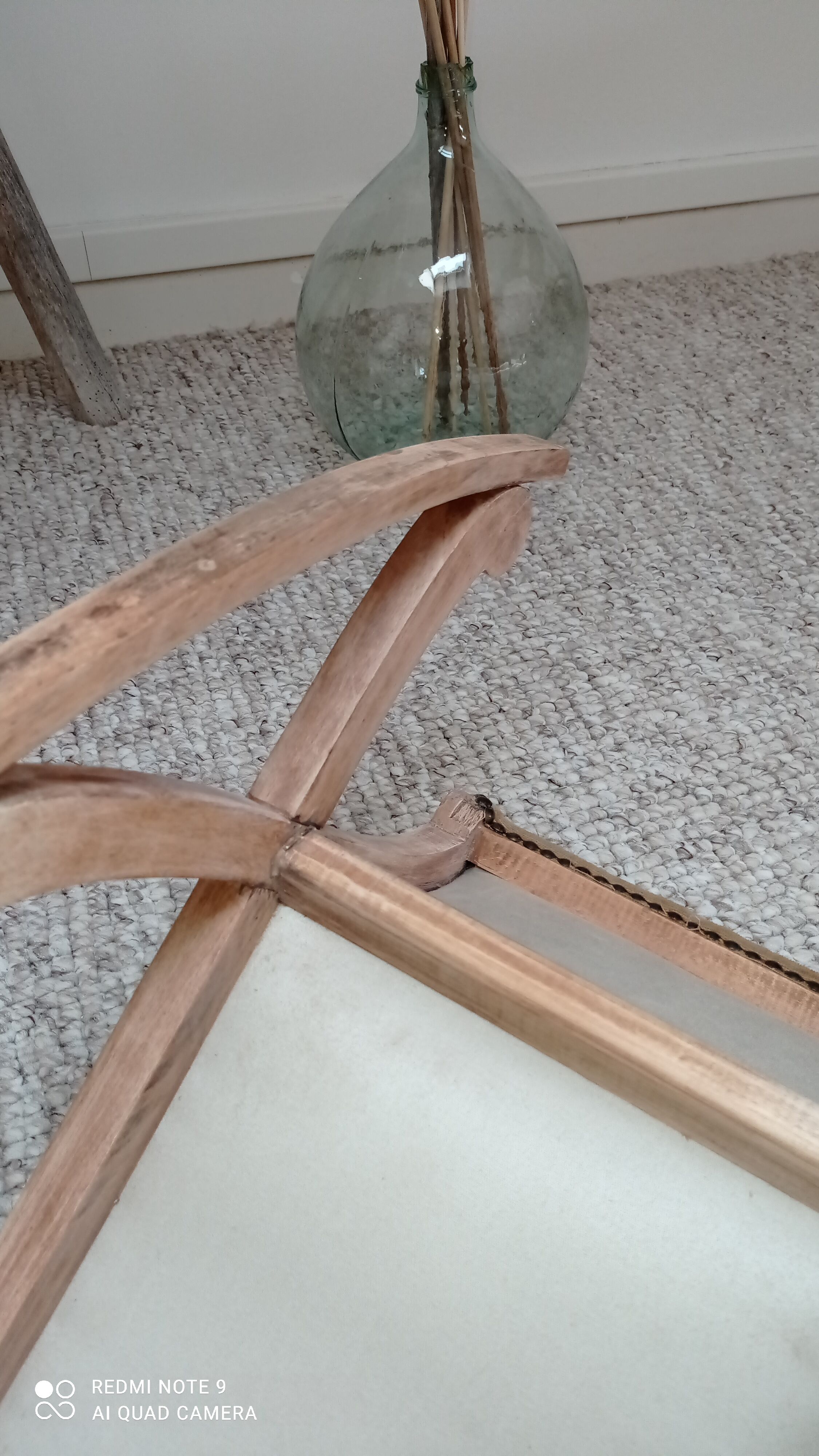 Footrest upholstered in wood