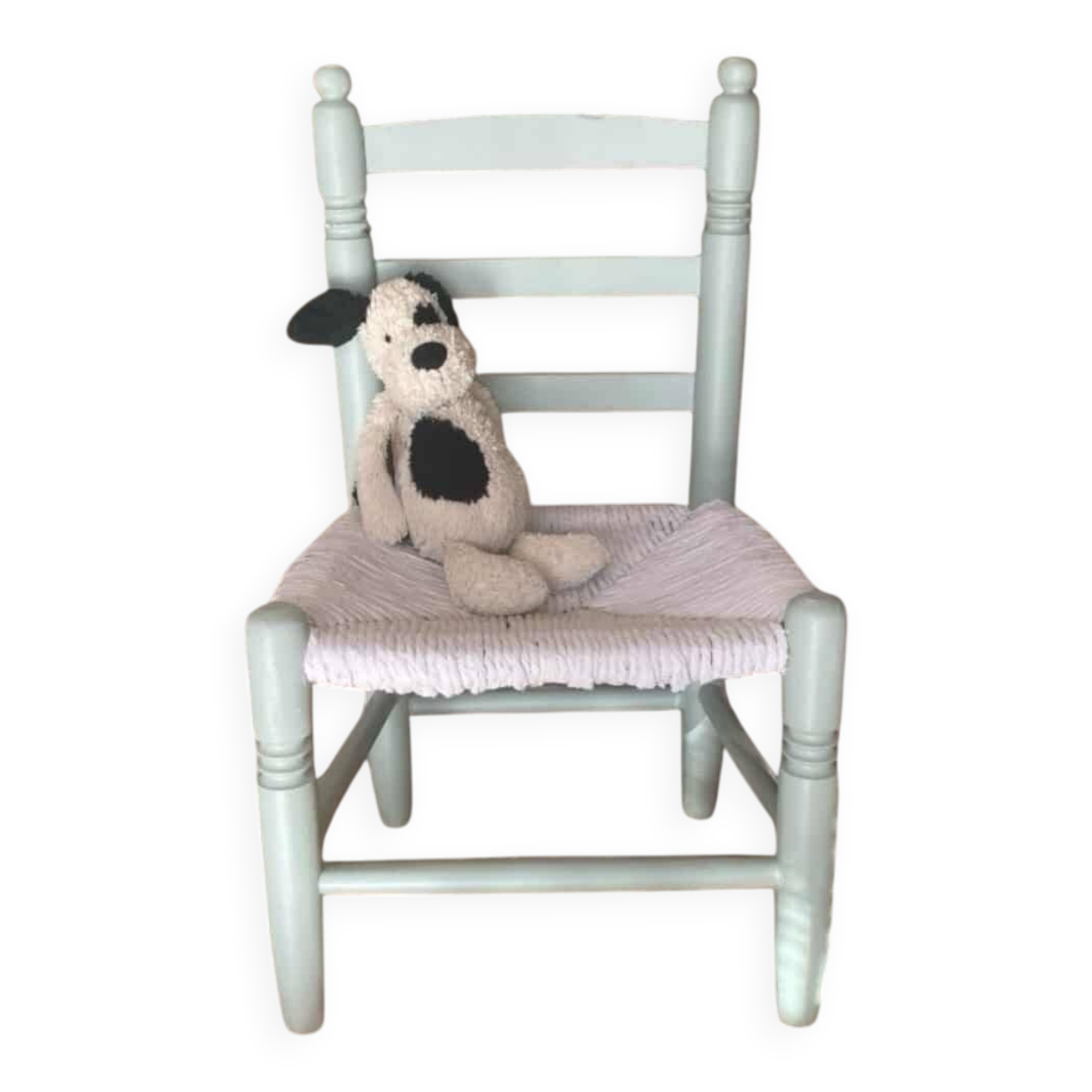 Child's chair in wood and straw revamped in almond green and white.