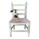 Child's chair in wood and straw revamped in almond green and white.