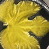 Wall plate by Pol Chambost with leaf pattern.