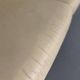 Two-seater designer sofa De Sede DS-2011 in cream leather with adjustable backrest.