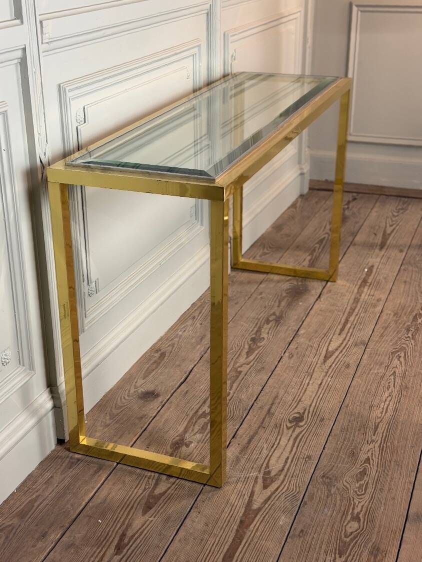 Golden and chrome metal console, bevelled glass, circa 1980.