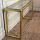 Golden and chrome metal console, bevelled glass, circa 1980.