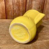 Vintage lemon yellow ceramic pitcher.