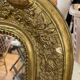 LARGE LOUIS XV STYLE ROCAILLE MIRROR IN GILT STUCCO FORAL DECOR ON PEDAL