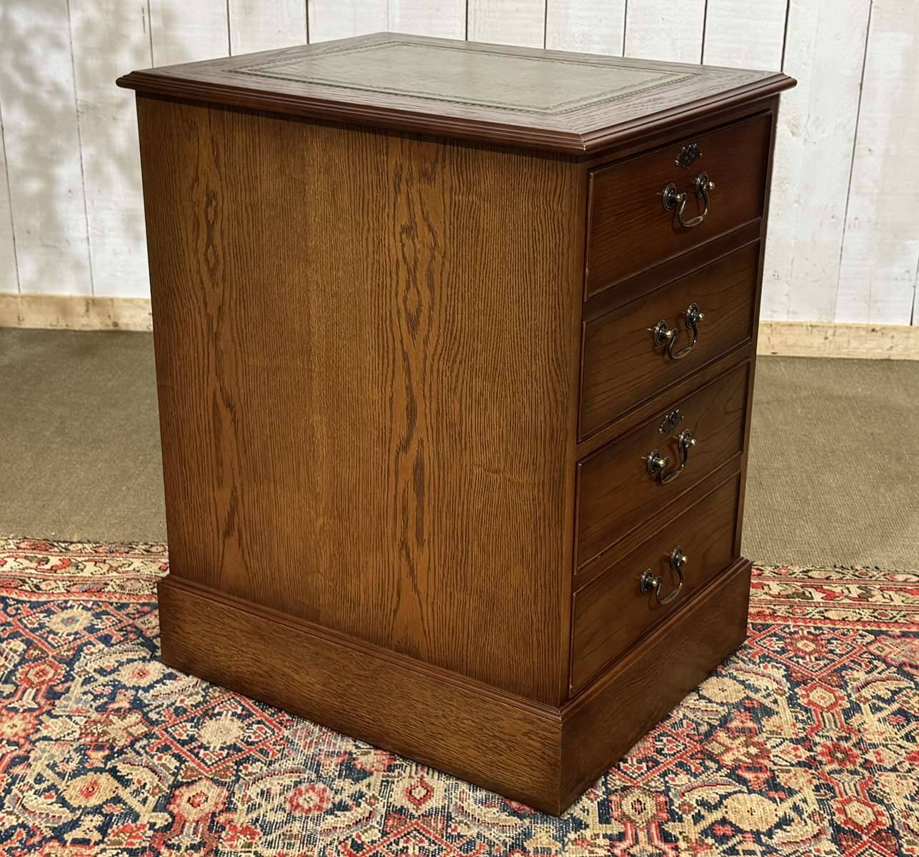 Office cabinet in oak with English leather top from the 1990s.