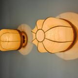 Pair of "cocoon" wall lights, resin and pine, Italy, 1970