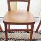 Set of 4 light wood bistro chairs stamped Baumann and Thonet.