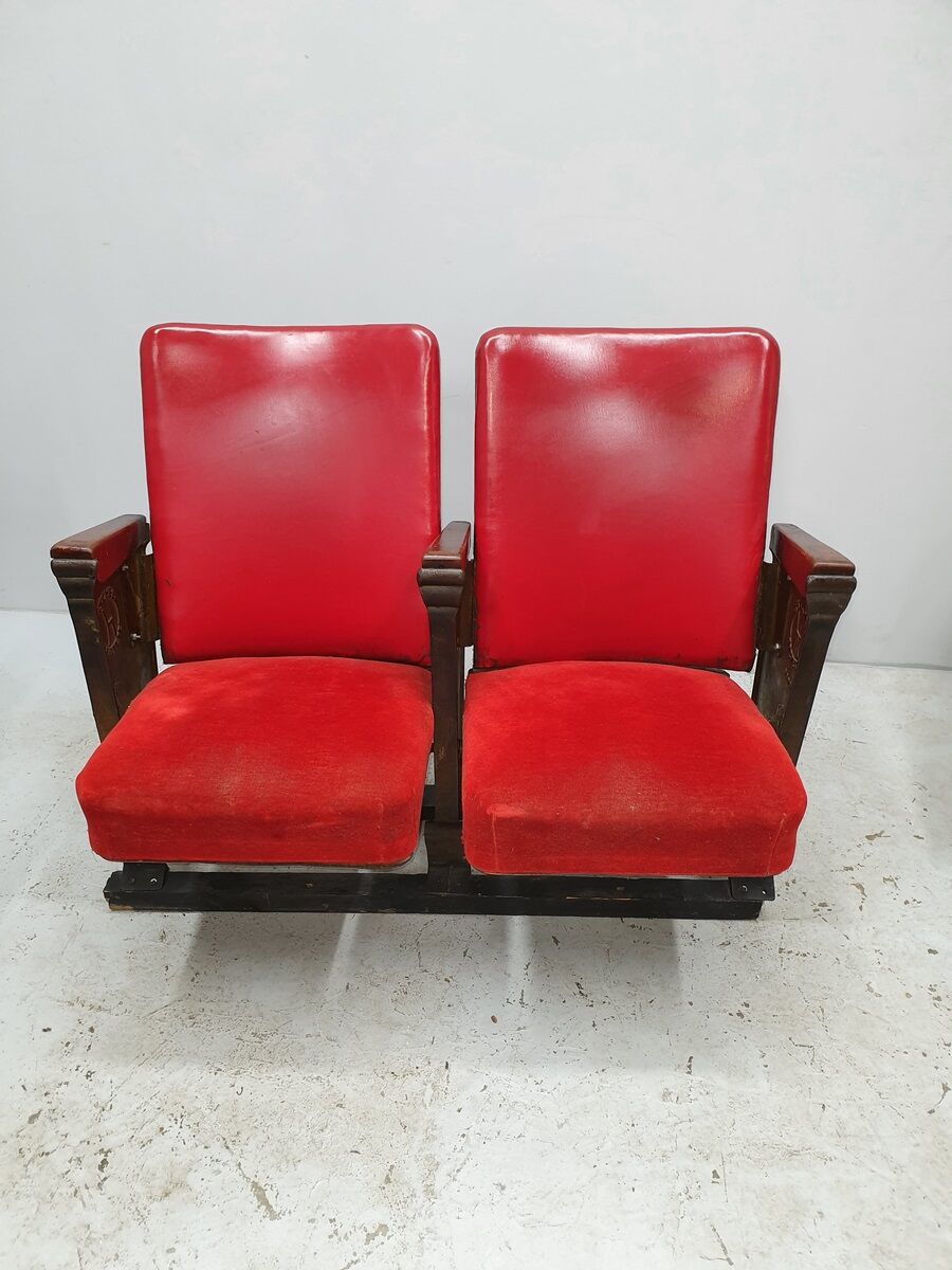 Series of 5 red skai and patinated cast Theater chairs