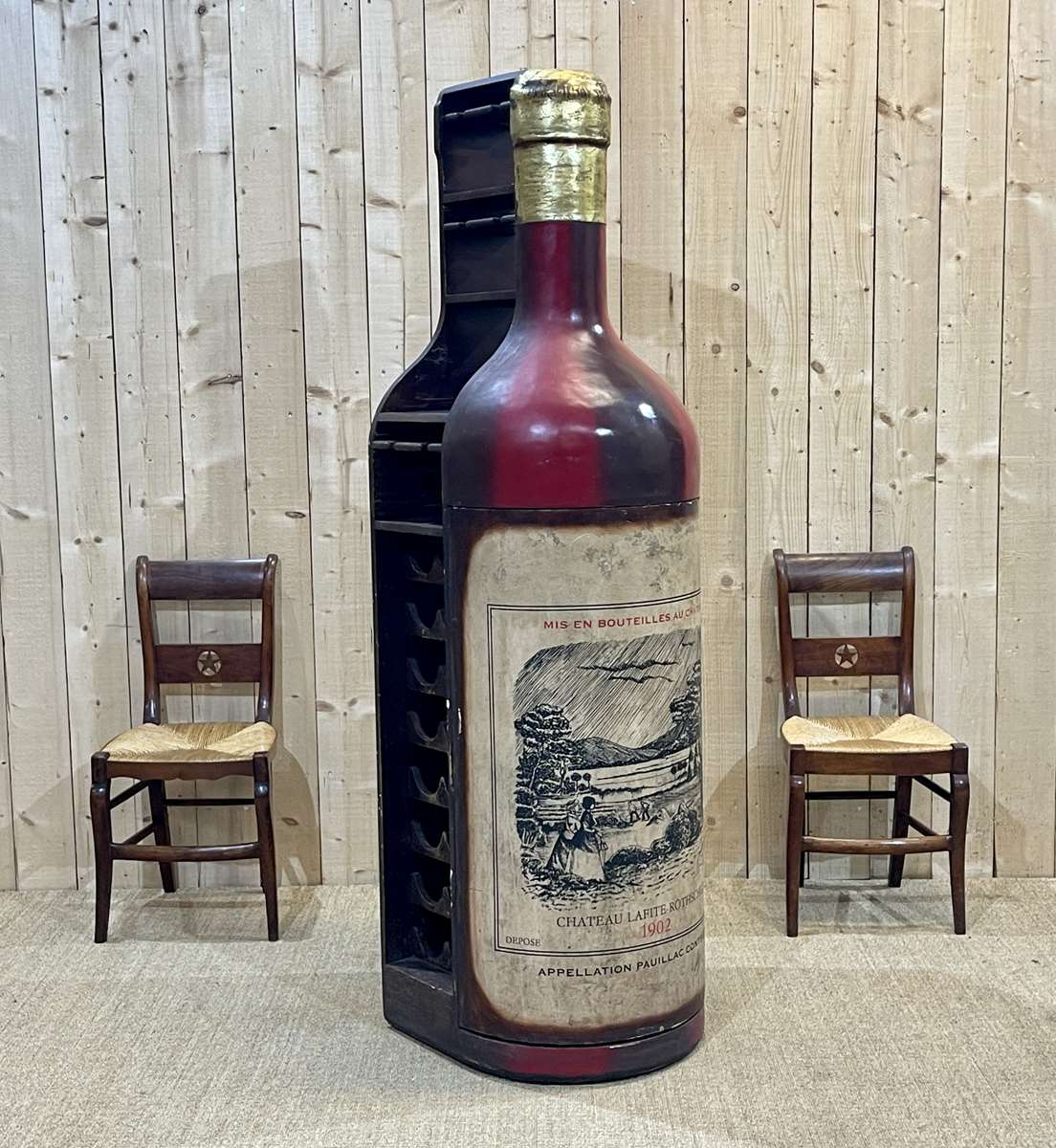 Advertising bar furniture in the shape of a giant wine bottle 90s