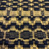 Romanian vintage carpet black design on a yellow background