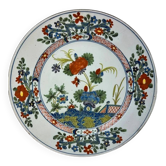 Plat en faïence de Delft à rehauts dorés, décor en relief, XVIIIe, 35 cm