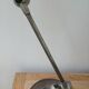 Jieldé lamp with 2 articulated metal arms, industrial style.