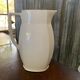 Vintage ceramic pitcher in white and blue from Gránitgyár Budapest, 1960s — floral halo pattern, square handle.