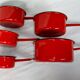 Red enamelled sheet metal pans