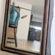 Miroir style Louis-Philippe en bois flammé noir et doré - 96 x 66 cm