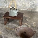 Small auxiliary stool in upcycled teak with traces of green chrome on the leg.